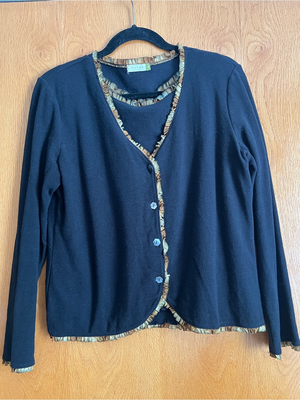 Chalet 2 piece waffle texture top with silk trim.  Size medium